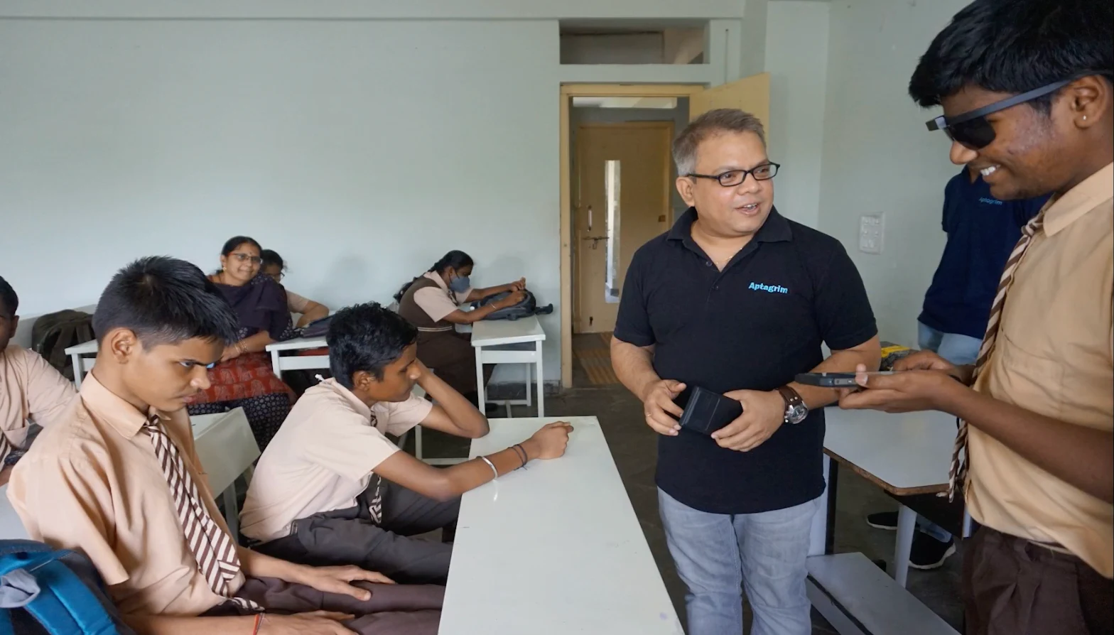 Sreegopal Mandapaka with students testing Apta-I at the Devnar School for the Blind